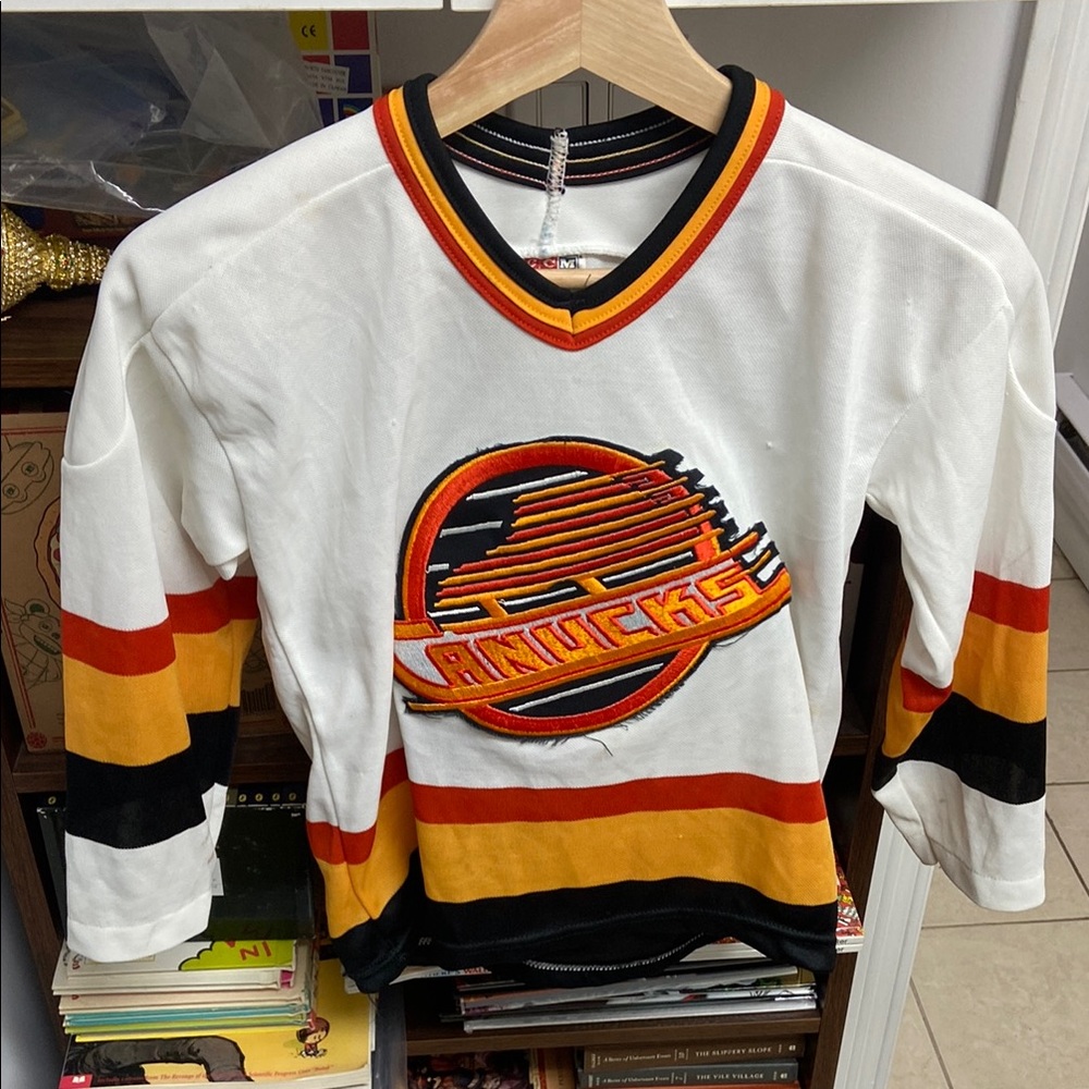 Vintage CCM White and Black Vancouver Canucks 90’s Logo Hockey Jersey